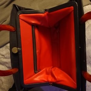 Faux tortoise shell handle hard structure purse